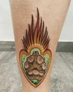 Este-es-un-tatuaje-en-color-de-estilo-tradicional-o-neotradicional-de-una-huella-de-mascota-1